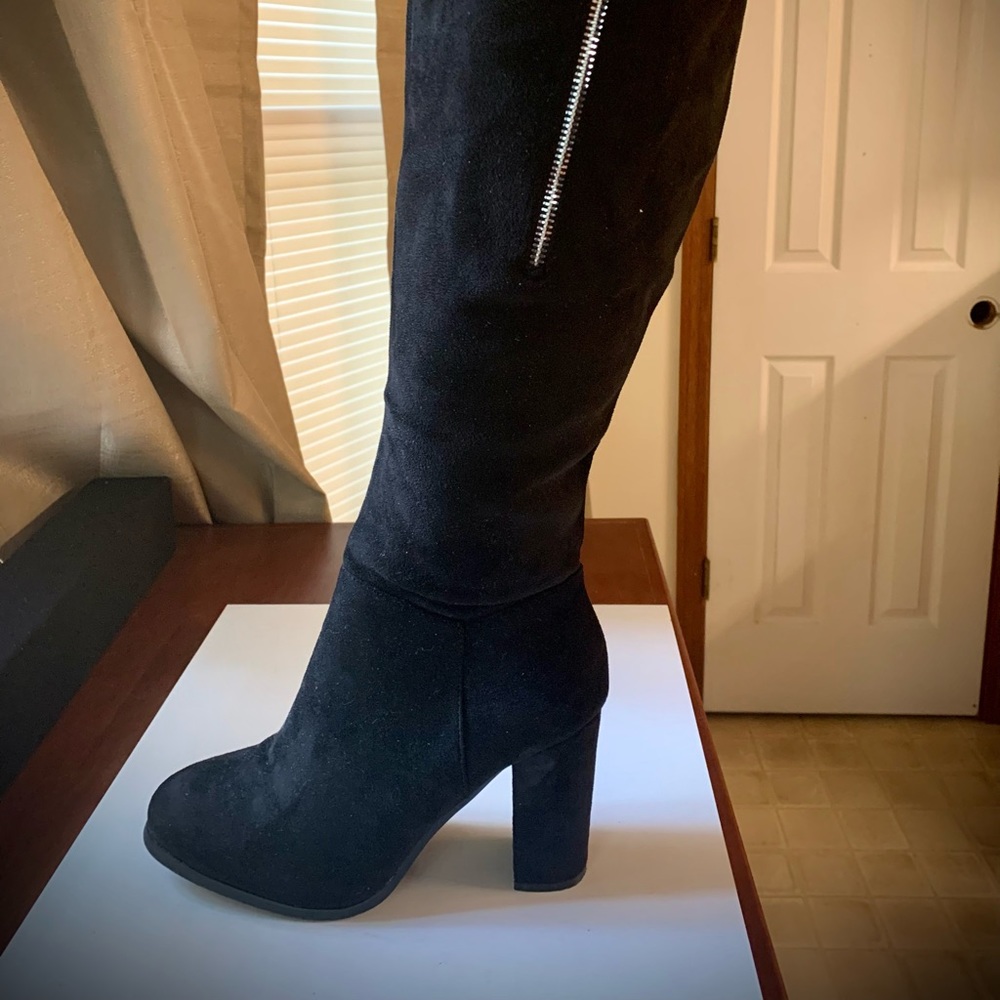 Black suede boots.